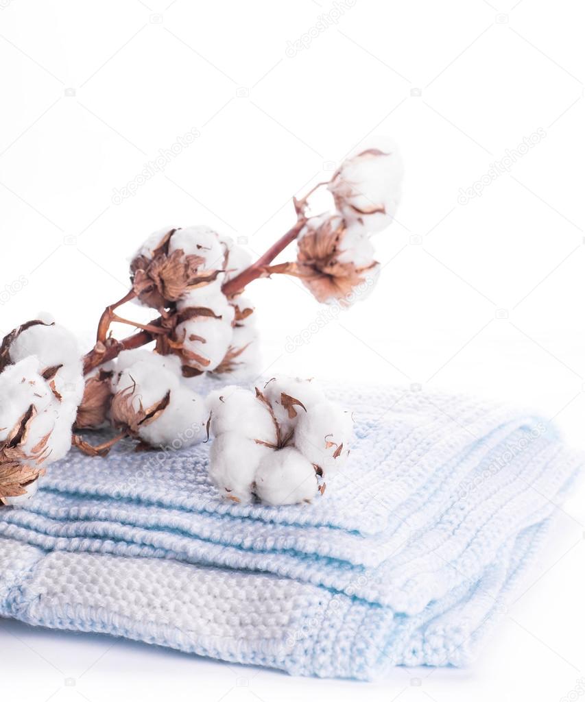 cotton buds and knitted fabric