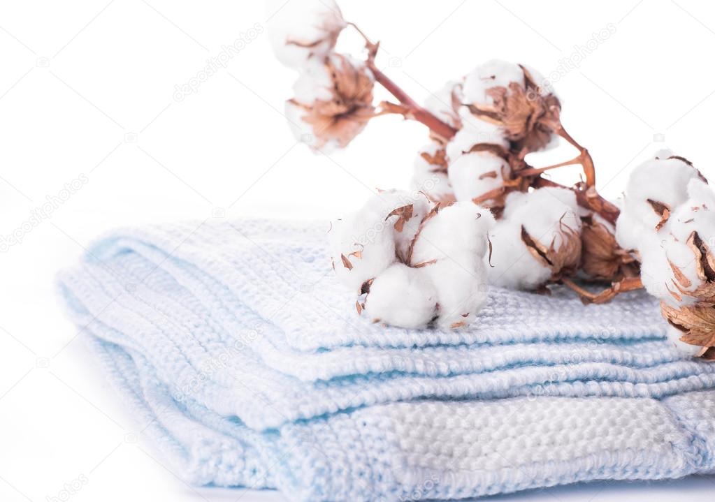 cotton buds and knitted fabric