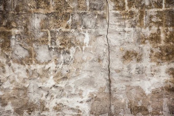 Oude muur met scheuren — Stockfoto