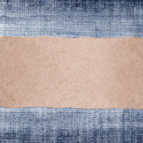 Paper label on jeans background — Stock Photo, Image