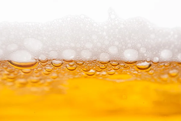 Beer bubbles in mug — Stock Photo, Image