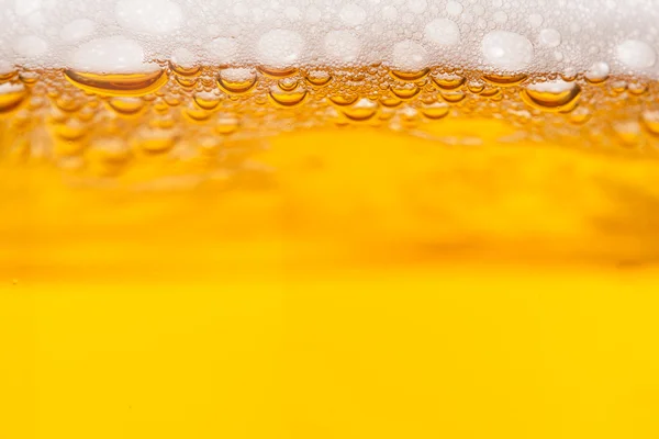 Beer bubbles in mug — Stock Photo, Image