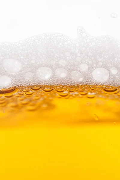 Beer bubbles in mug — Stock Photo, Image