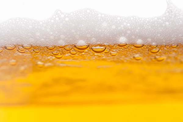 Beer bubbles in mug — Stock Photo, Image