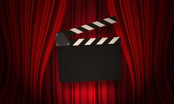 Movie clapperboard on a red — Stock Photo, Image