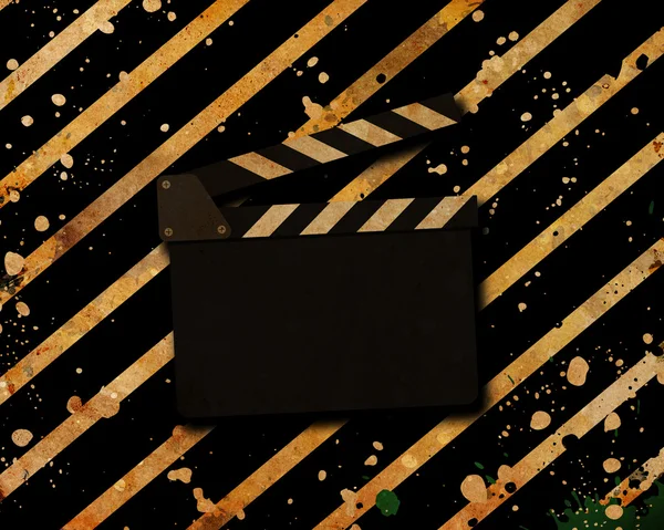 Film clapperboard auf einem Grunge — Stockfoto