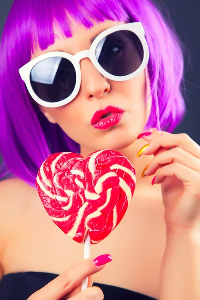 Beautiful woman wearing colorful wig — Stock Photo, Image