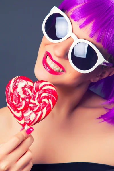 Beautiful woman wearing colorful wig — Stock Photo, Image