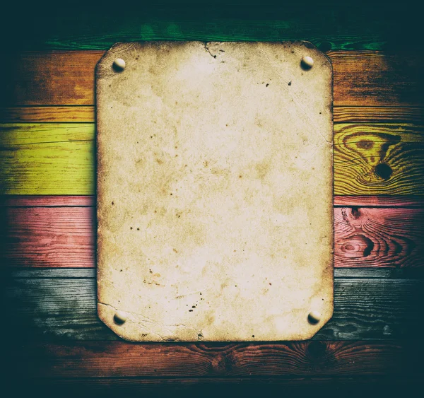 Old paper on wood background — Stock Photo, Image