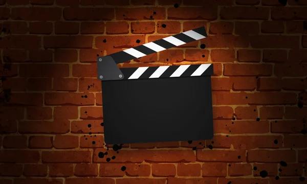 Movie clapperboard on a grunge — Stock Photo, Image