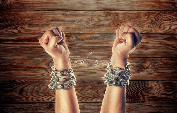 Two hands in chains — Stock Photo, Image