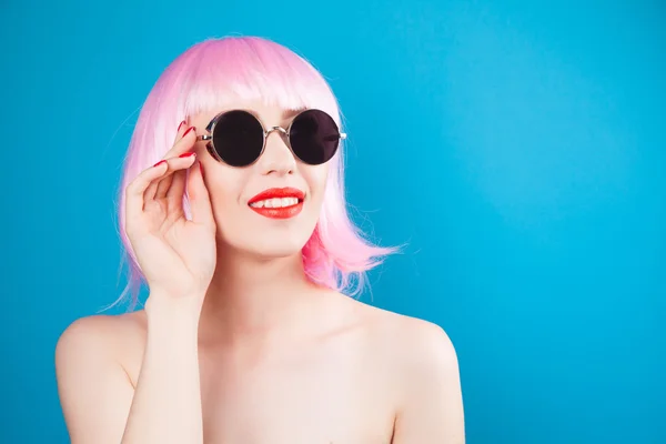 Beautiful woman wearing pink wig — Stock Photo, Image