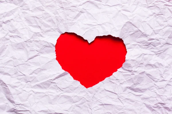 White torn paper in heart shape symbol — Stock Photo, Image