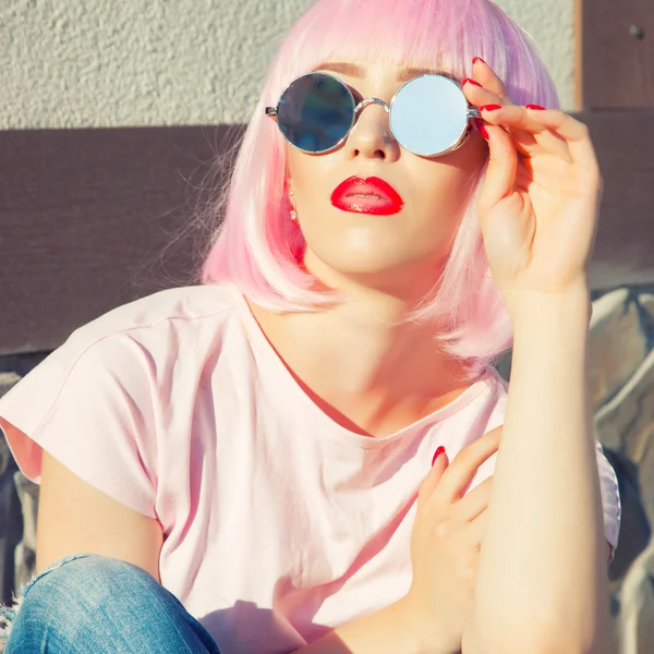 Beautiful woman wearing colorful wig — Stock Photo, Image