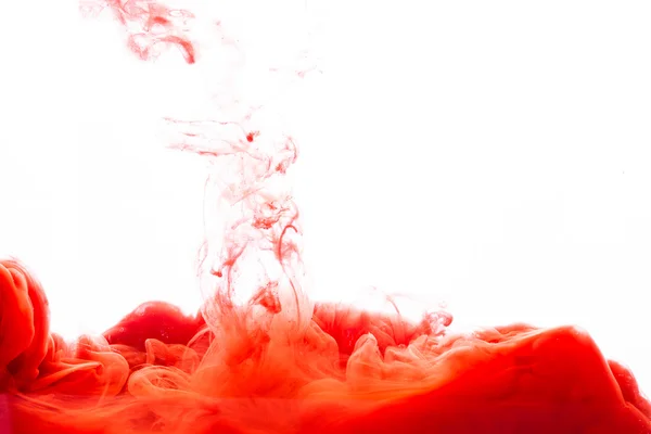 Orange inks in water — Stock Photo, Image