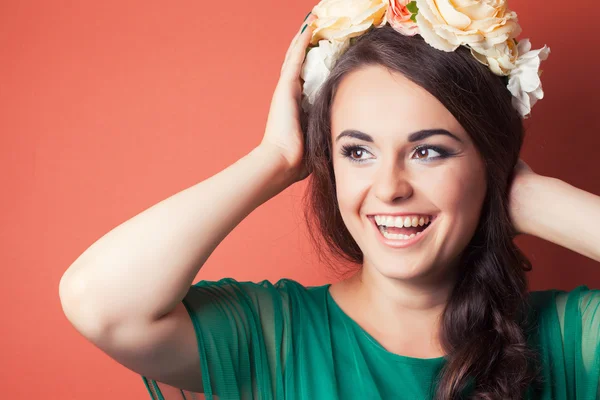 Beautiful young woman wearing wreath — Stock Photo, Image