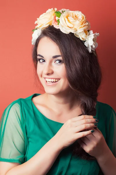 Beautiful young woman wearing wreath — Stock Photo, Image