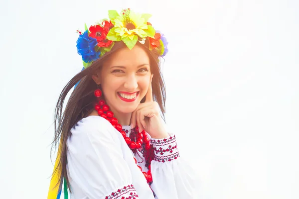 Woman wearing national ukrainian clothes outdoors Stock Picture