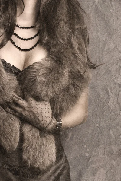 Woman wearing corset and fur — Stock Photo, Image