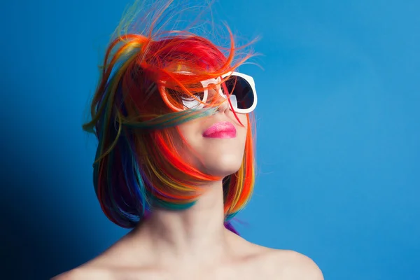 Woman in wig and sunglasses