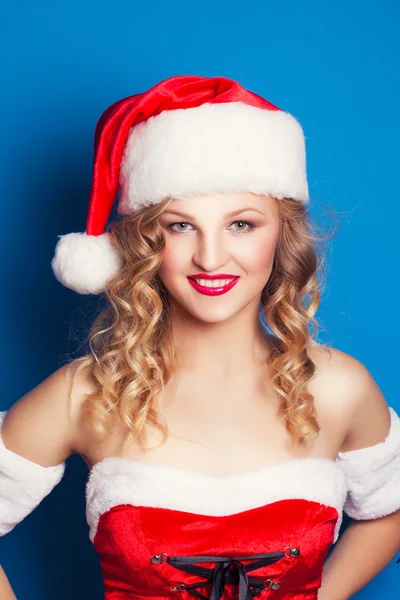 Vrouw in kerstman kostuum — Stockfoto