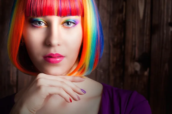 Woman wearing colorful wig