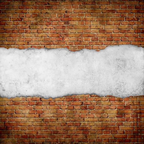 Vintage paper on old red brick wall — Stock Photo, Image