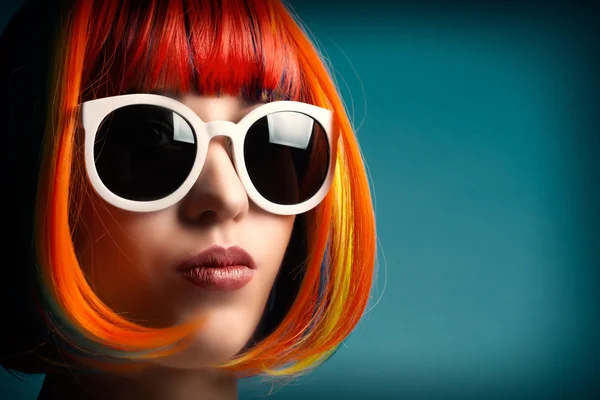 Beautiful woman in colorful wig — Stock Photo, Image