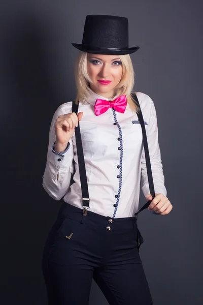 Woman wearing top hat and bow tie — Stock Photo, Image