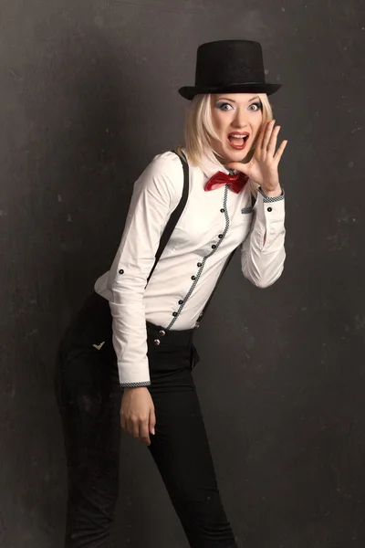 Woman wearing top hat and bow tie — Stock Photo, Image