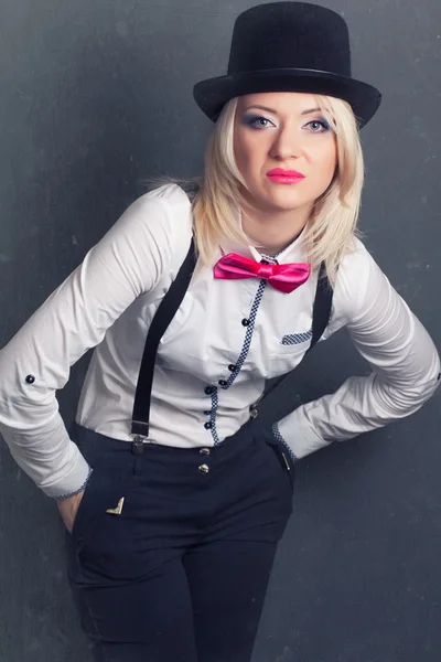 Woman wearing top hat and bow tie — Stock Photo, Image