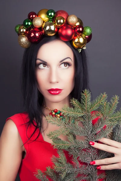 Woman wearing Christmas wreath — Stock Photo, Image