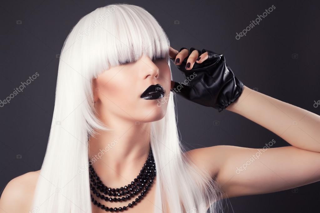 Blonde woman with black make-up