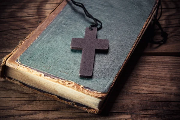 Christian cross on bible