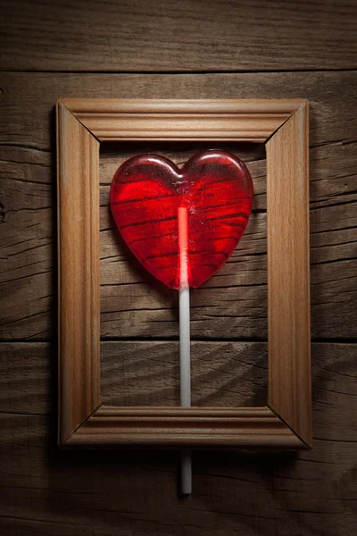 Lolly hart op vintage frame — Stockfoto