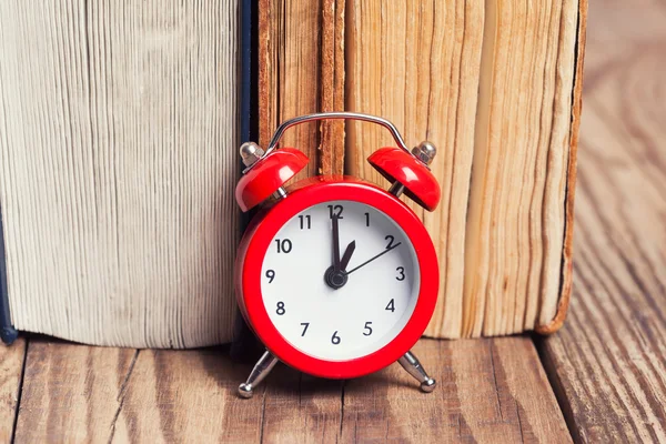 Vintage books and alarm clock — Stock Photo, Image