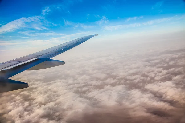 Wing of the plane on sky background — Stock Photo, Image