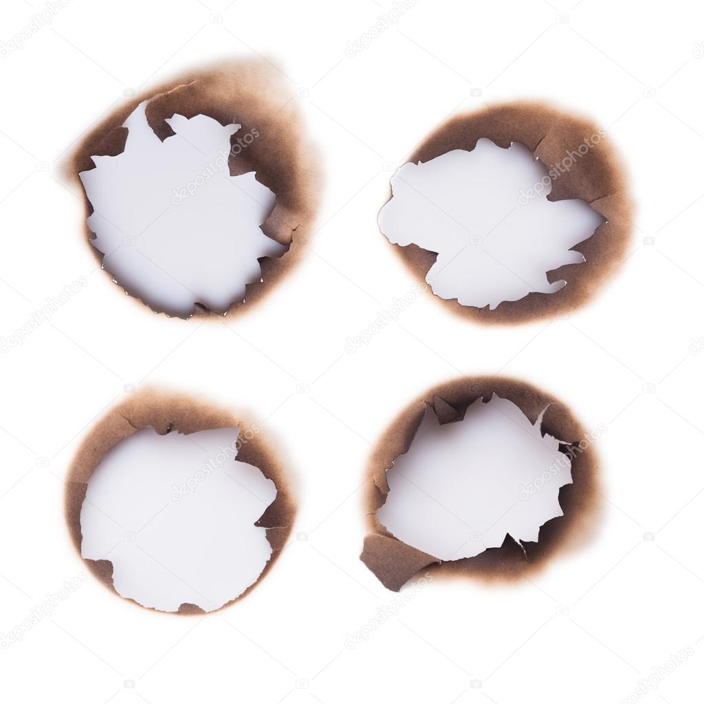 Burned holes in a paper