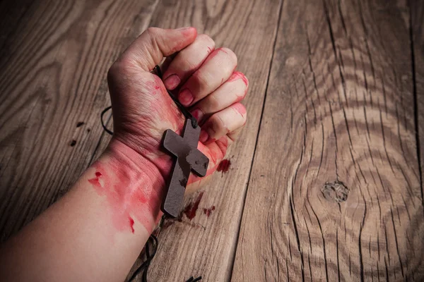 Old cross in hand — Stock Photo, Image