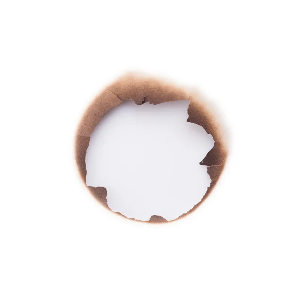 Buraco queimado em papel — Fotografia de Stock