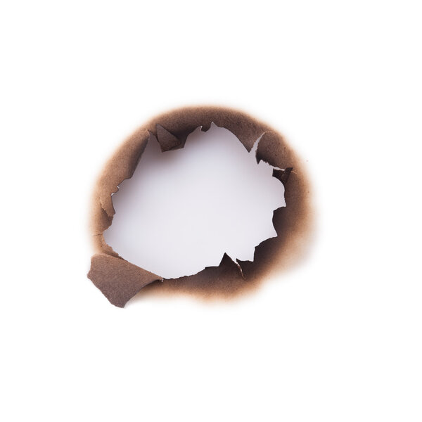 Burned hole in paper