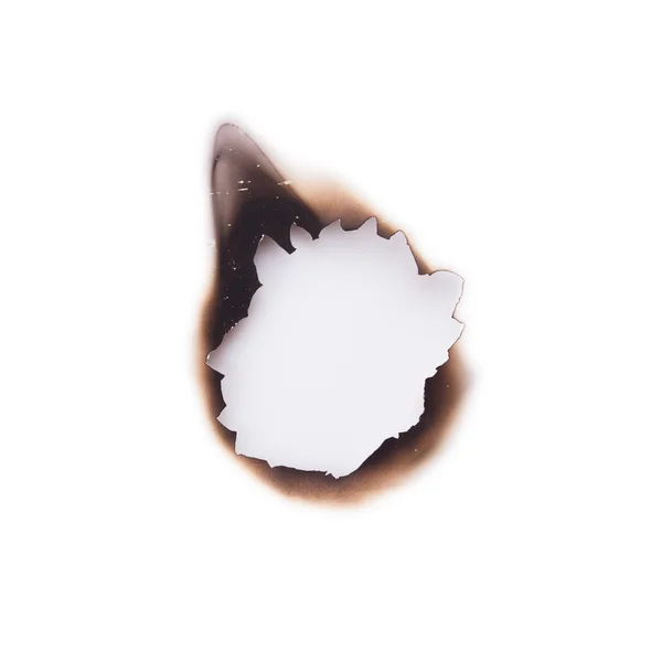 Burned hole in paper — Stock Photo, Image
