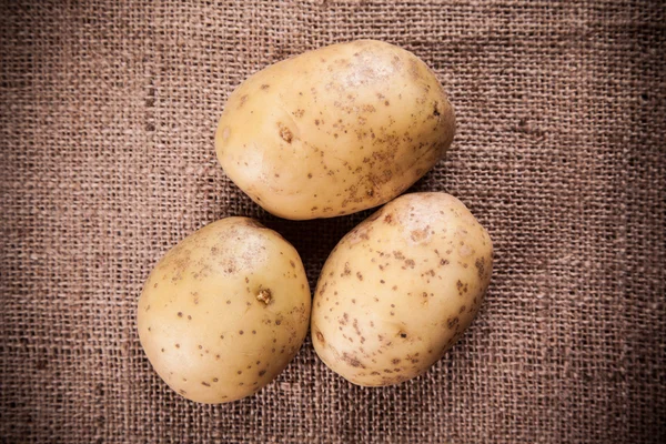 Three Fresh Potatoes — Stock Photo, Image