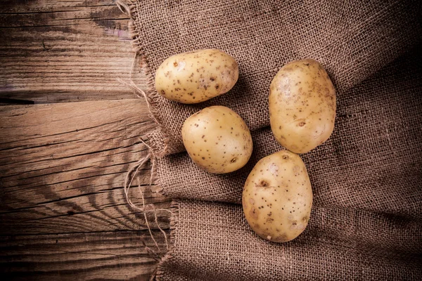 Potatoes with Vintage Burlap Bag — Stock Photo, Image