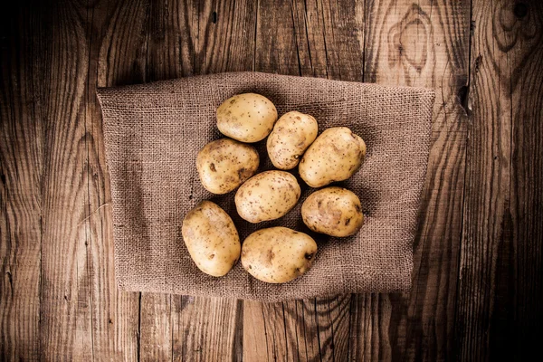 Potatoes with Vintage Burlap Bag — Stock Photo, Image
