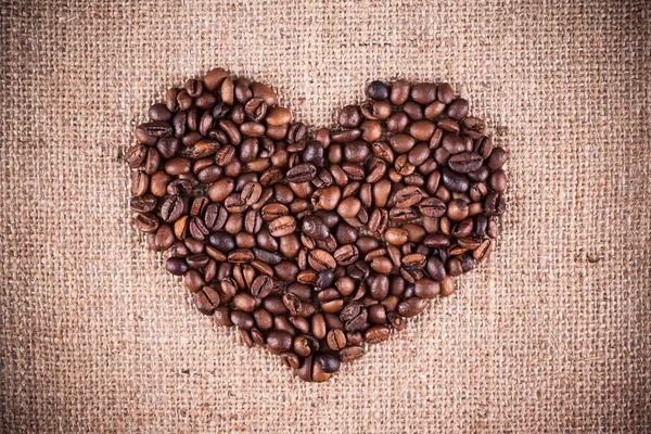 Kalp şeklinde kahve çekirdeği. — Stok fotoğraf