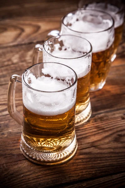 Close-up of mugs of beer — Stock Photo, Image