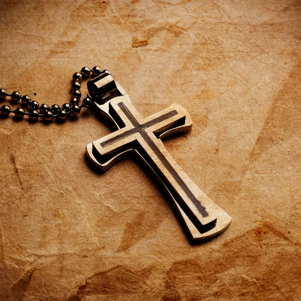 Cross on parchment paper — Stock Photo, Image