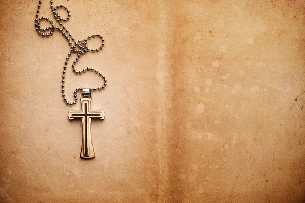 Cross on parchment paper — Stock Photo, Image