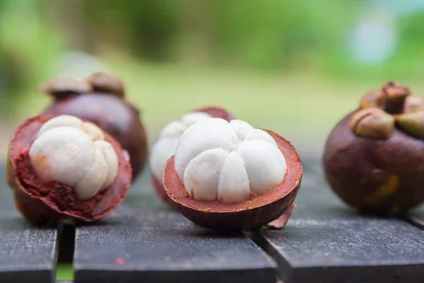 Mangosteens on a wooden table — Stock Photo, Image